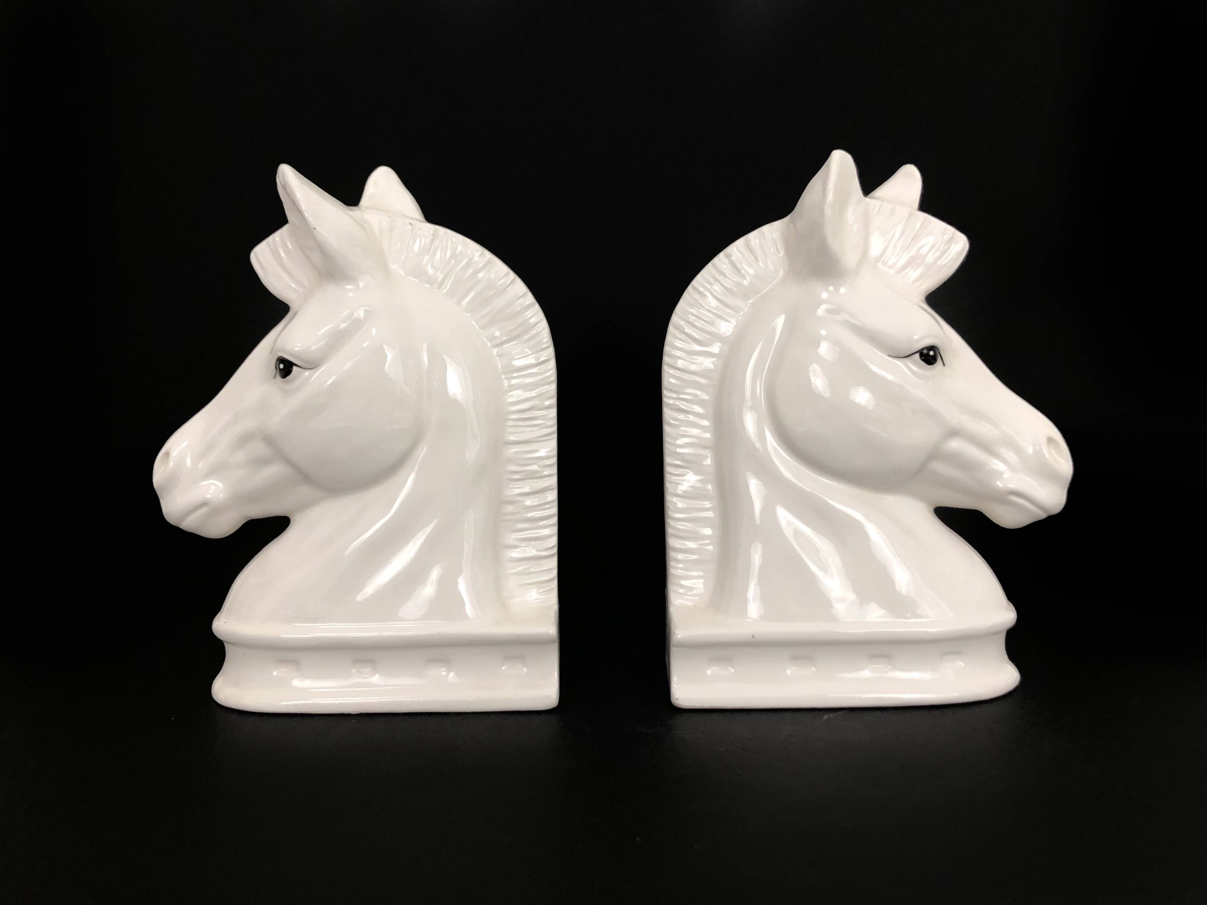 Pair of vintage white ceramic weighted horse bookends. 80 years