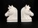 Pair of vintage white ceramic weighted horse bookends. 80 years