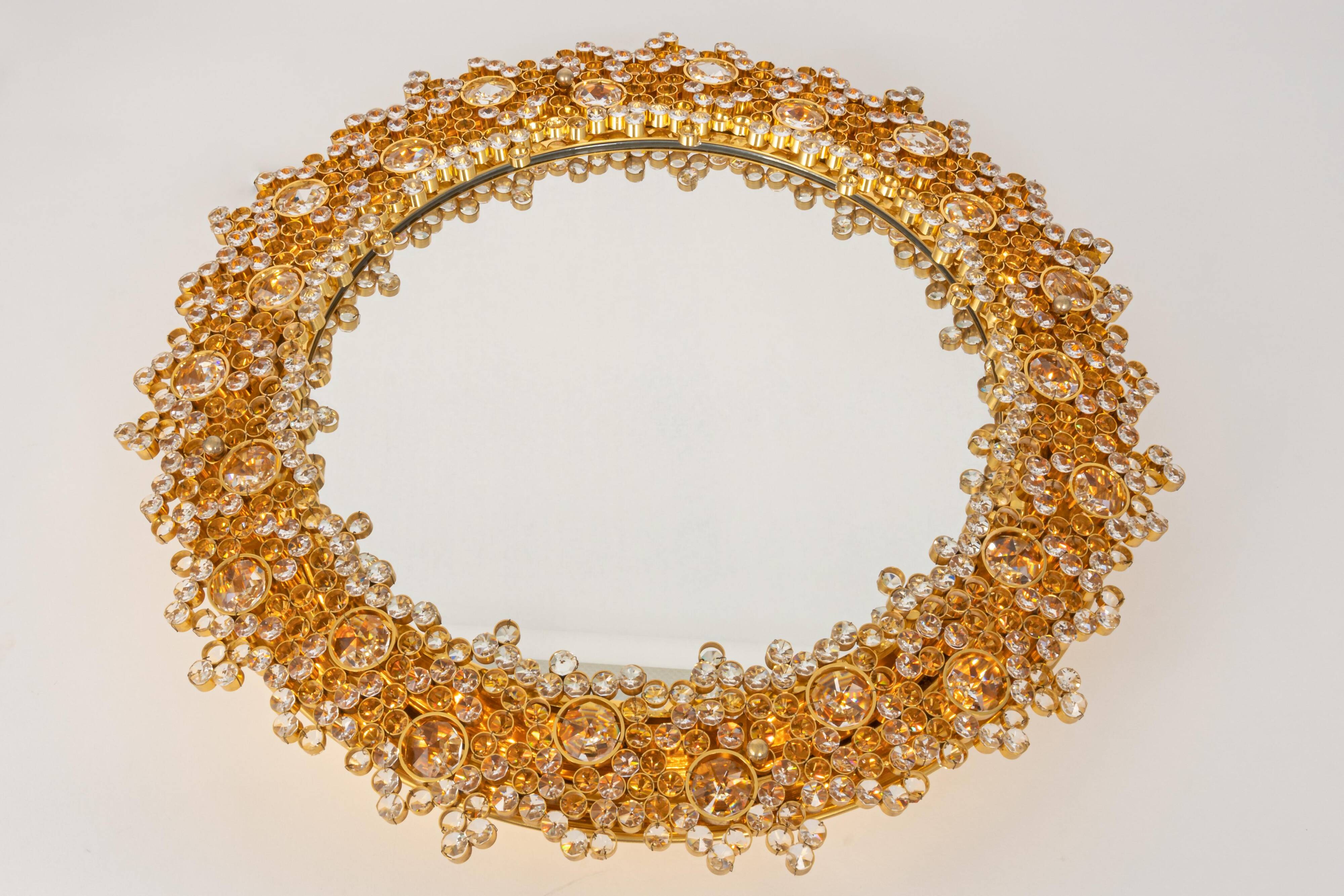 Spectacular backlit mirror in gilded brass and crystal glass by Palwa, Germany.
