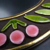 Small round mirror in earthenware- Cherry enamelled decoration - circa 1970