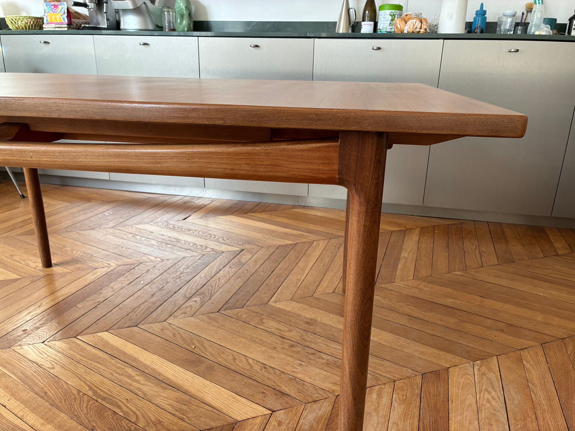 Extendable dining table in teak by Ib Kofod-Larsen
