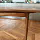 Extendable dining table in teak by Ib Kofod-Larsen