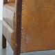 Cognac-colored sheepskin and wooden Art Deco design armchair