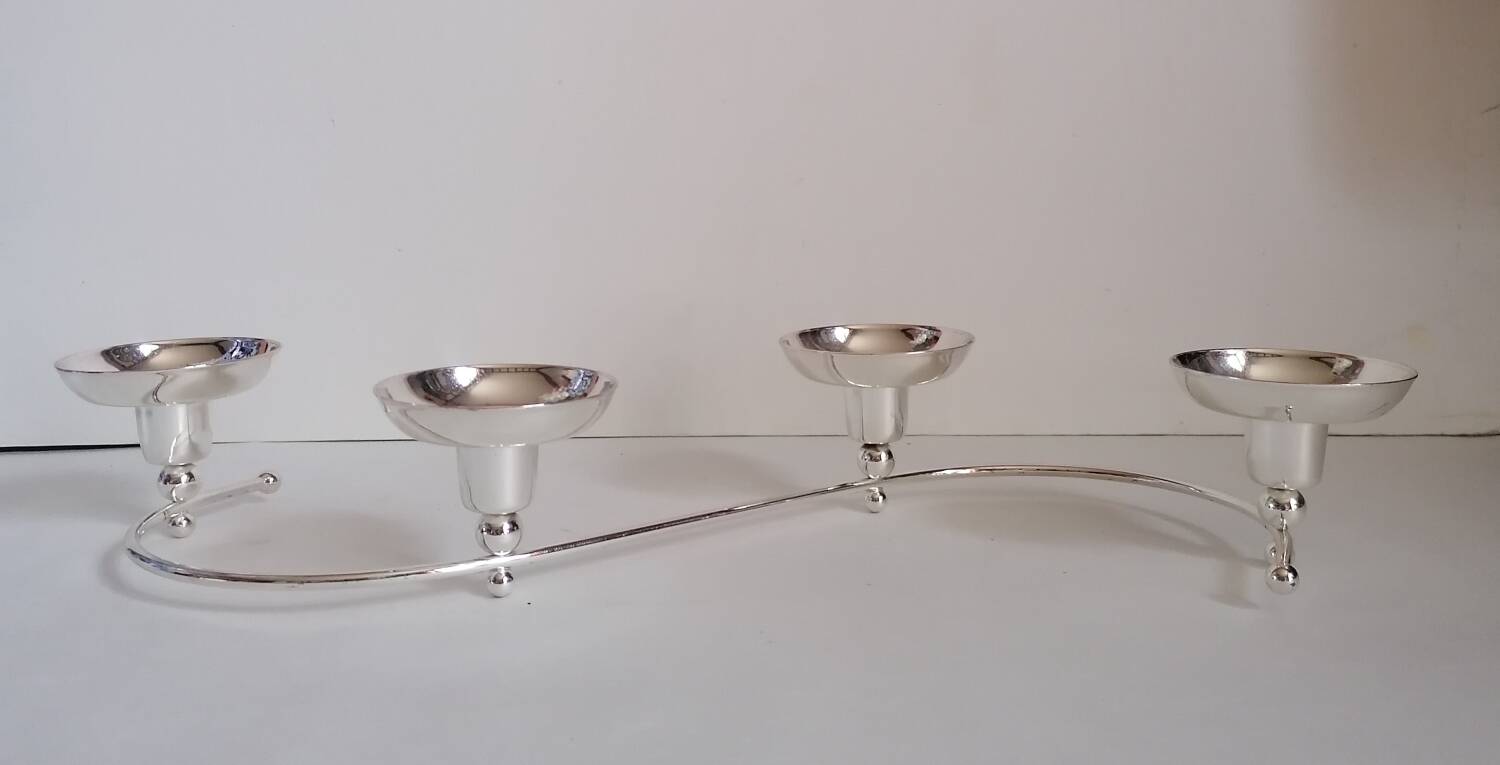 4-light silver metal candle holder