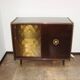 A vintage cabinet with a record player and a bar, 1960s.