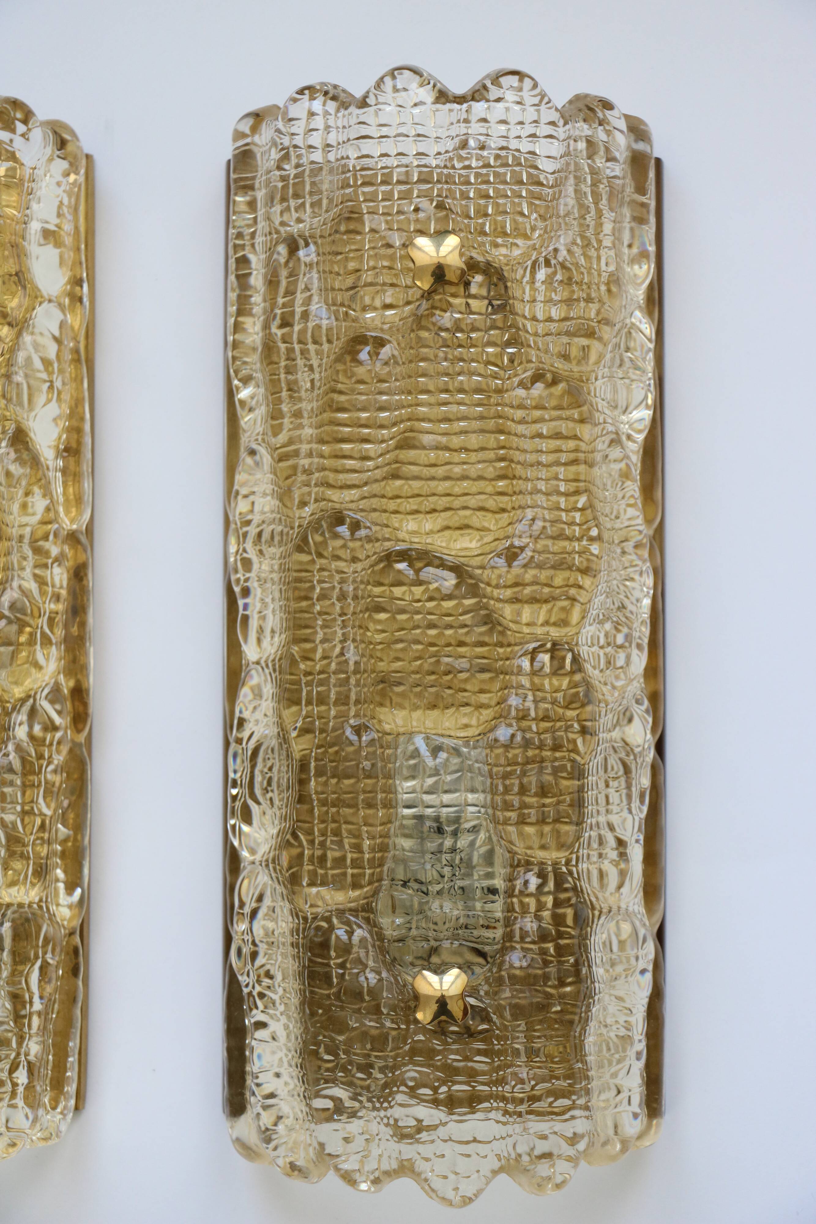 Pair of glass and brass wall lights by Carl Fagerlund for Orrefors, 1960.