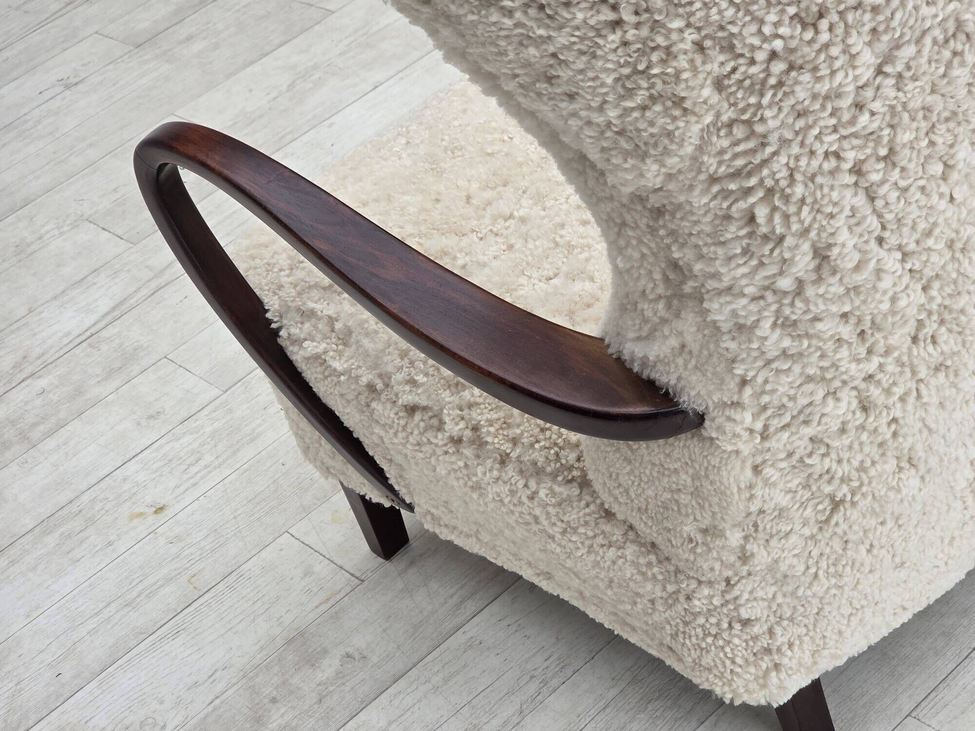 1960s, Danish high-back armchair, genuine sheepskin, reupholstered.