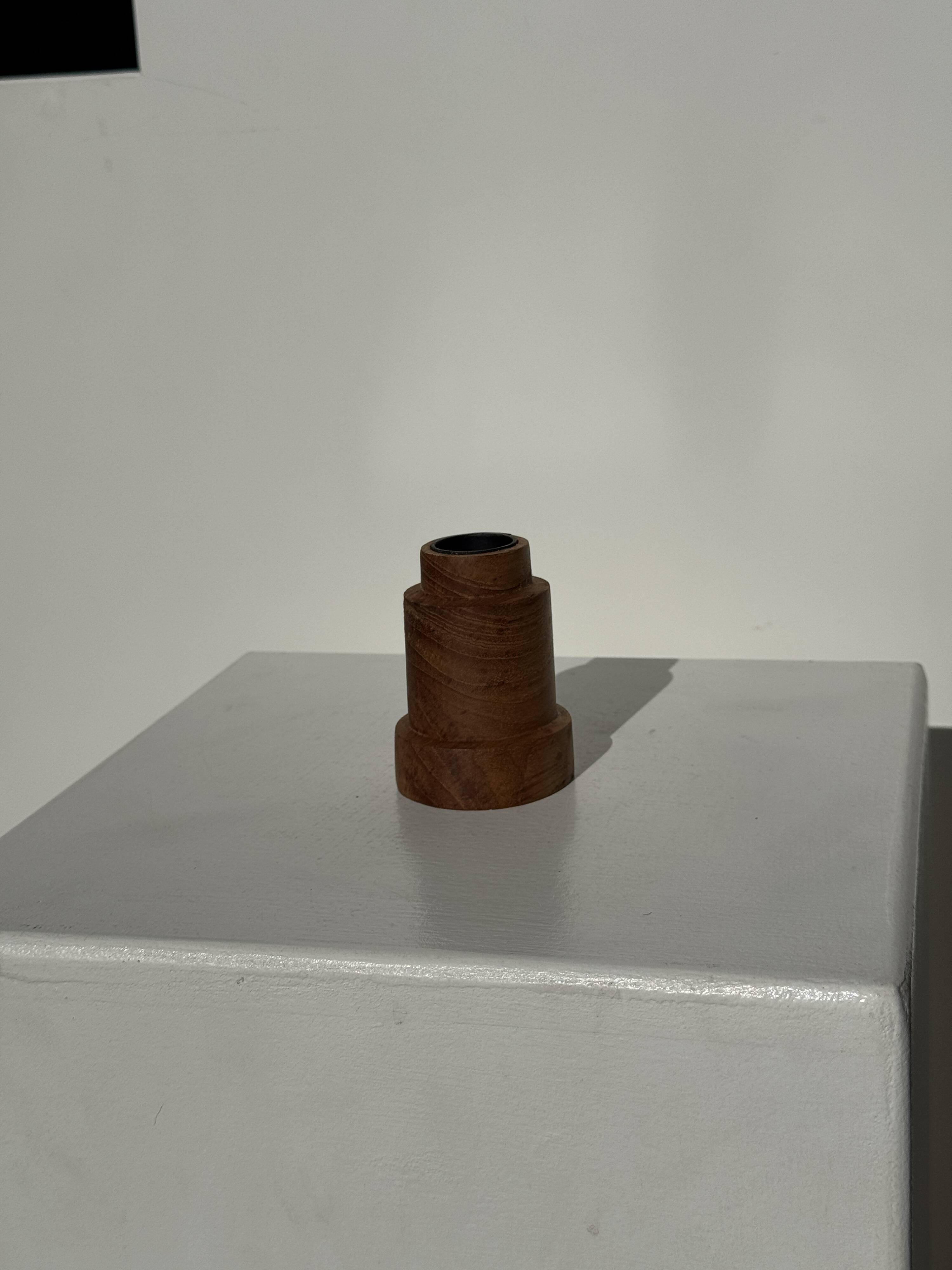 Circular teak monoxyle candlestick, pyramidal with a high central part H7 D5.