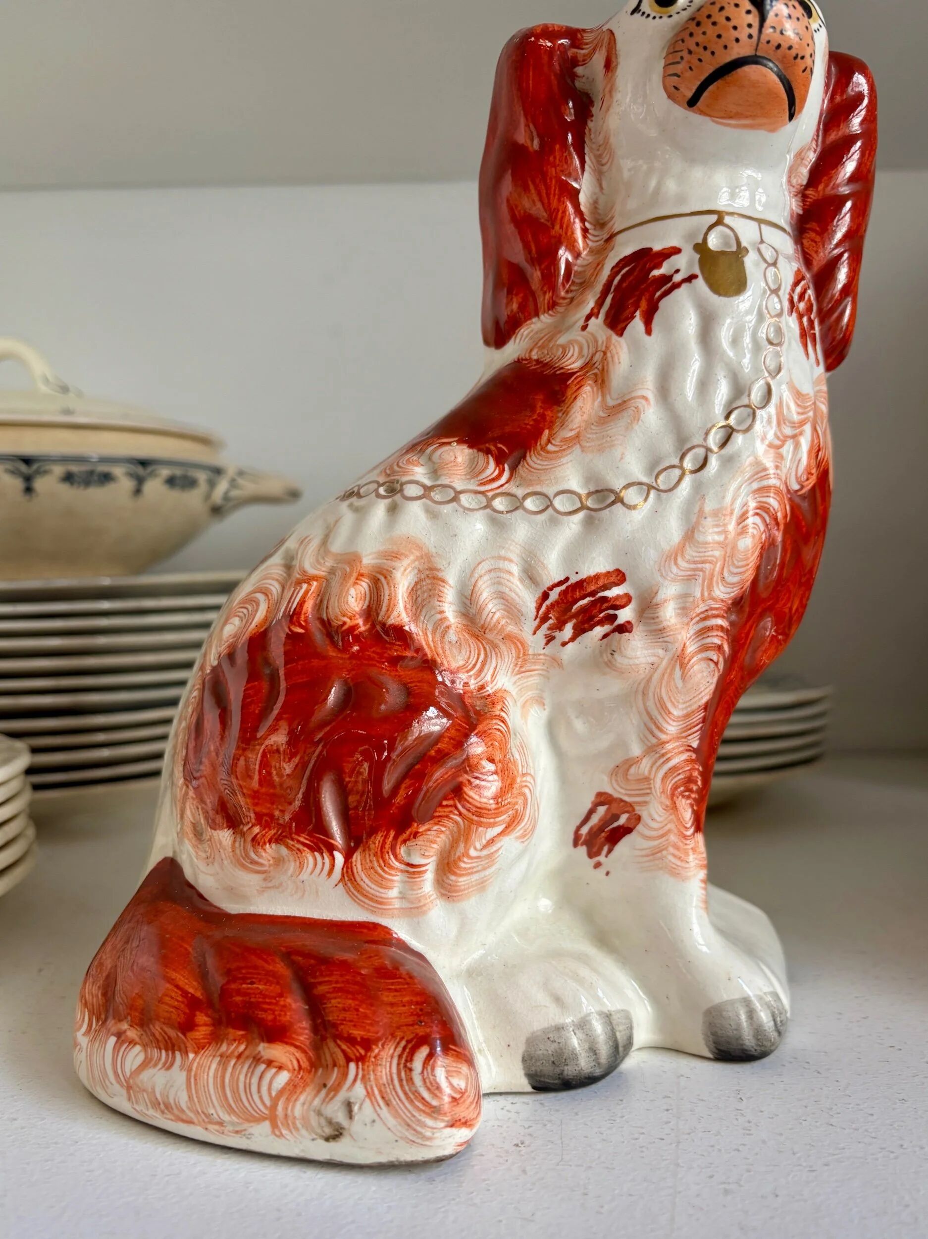 Staffordshire porcelain King Charles Cavalier dog in red, number 2, 19th century.