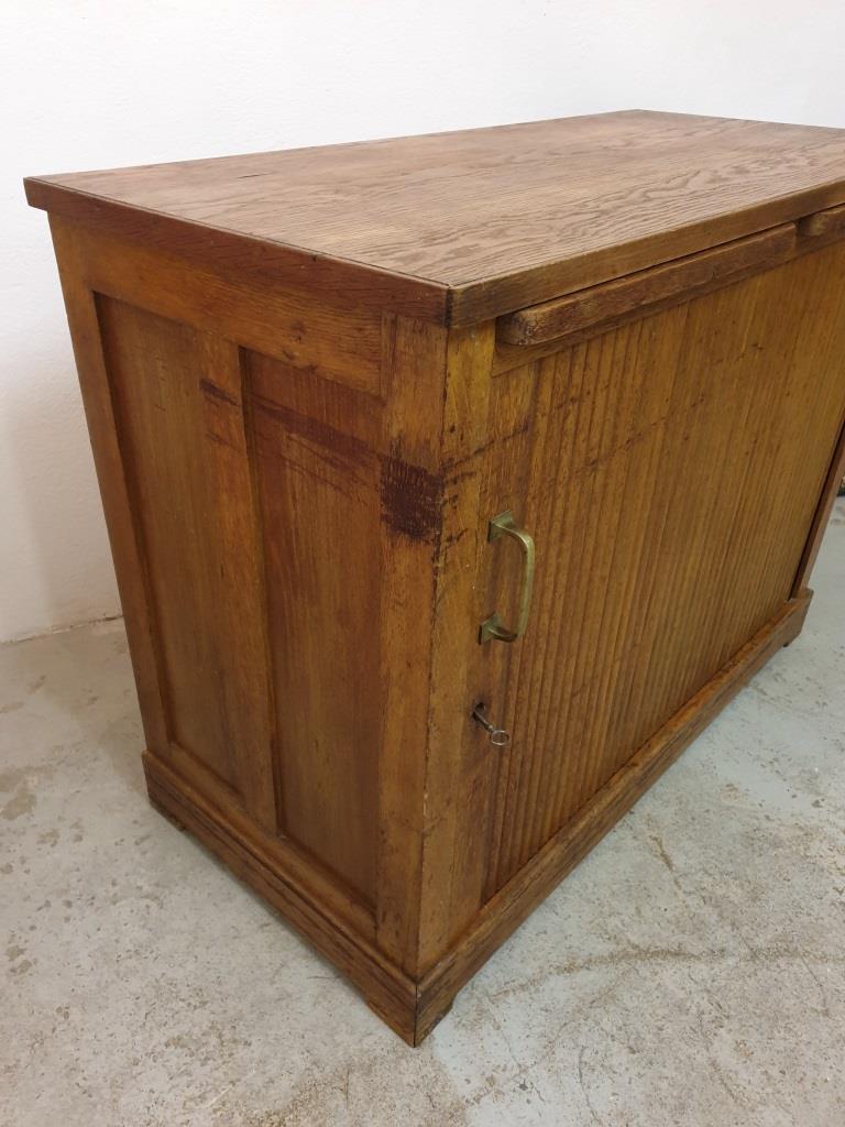 Meuble à rideau