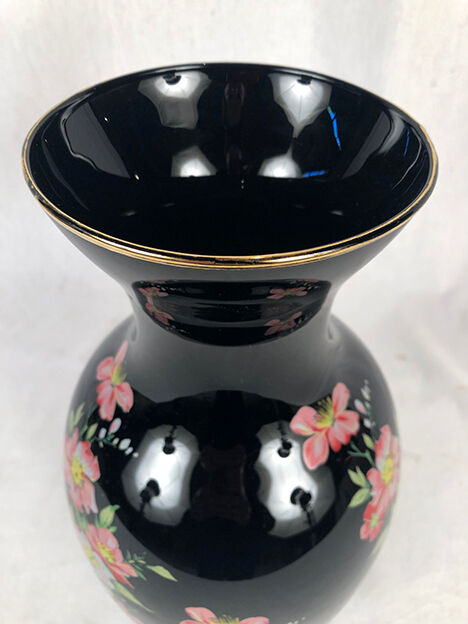 Black opal vase decorated with flowers
