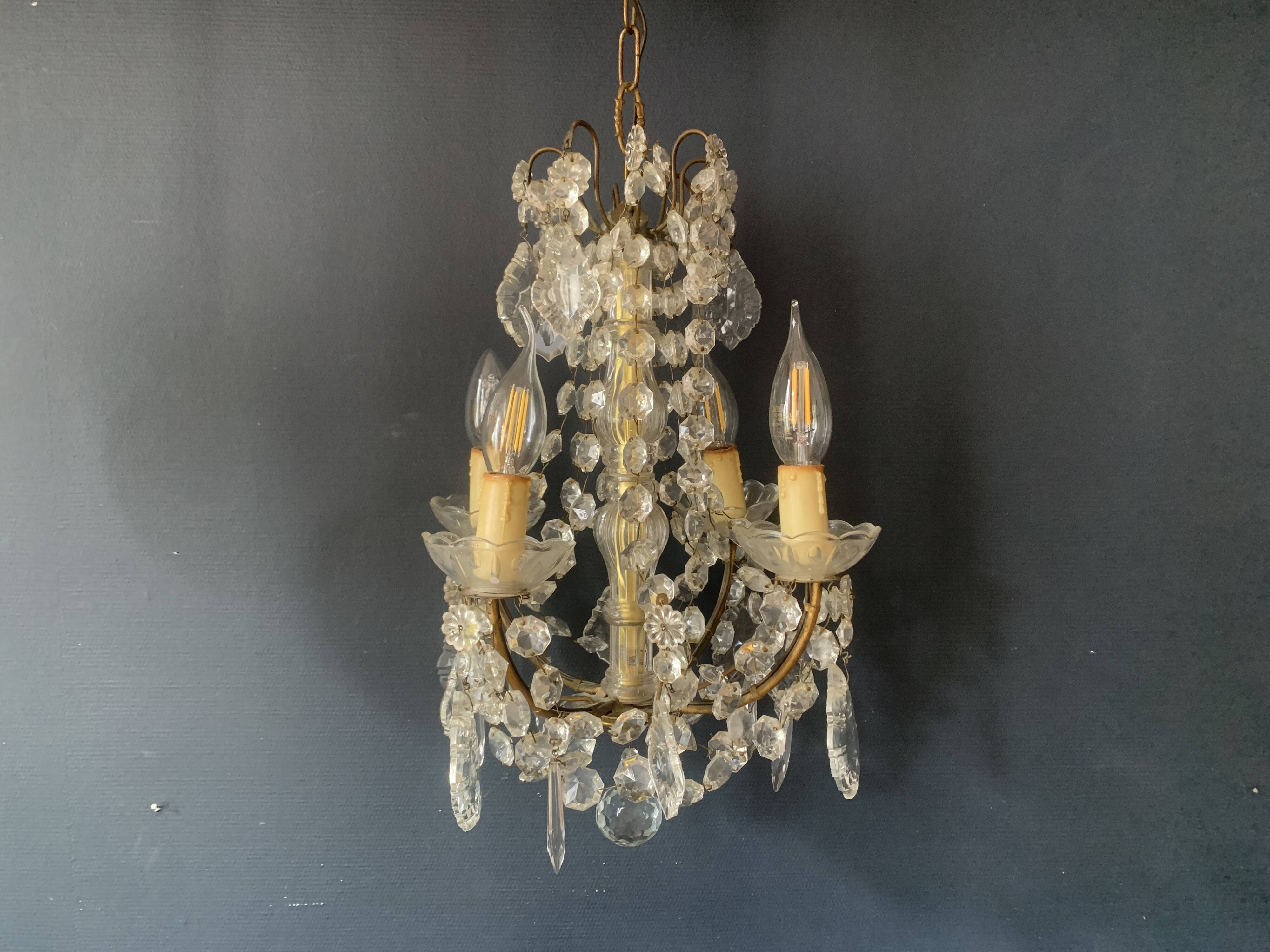 Small antique chandelier with tassels and bronze from the early 20th century