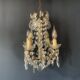 Small antique chandelier with tassels and bronze from the early 20th century