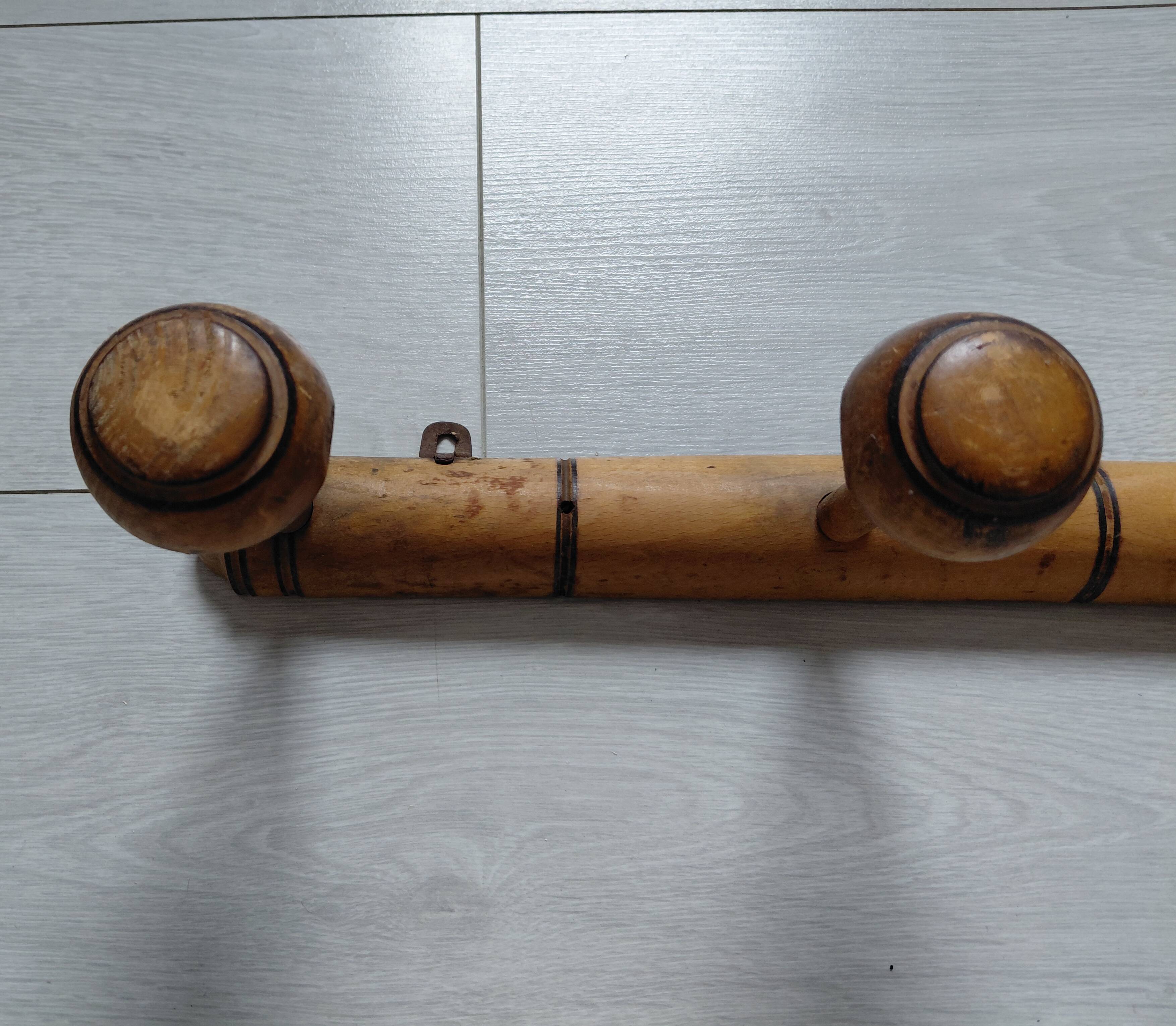 Wooden wall coat rack