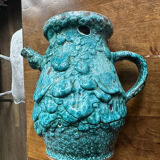Strange ancient turquoise pitcher