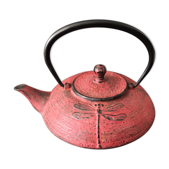 Cast iron teapot dark pink color. Dragonfly patterns