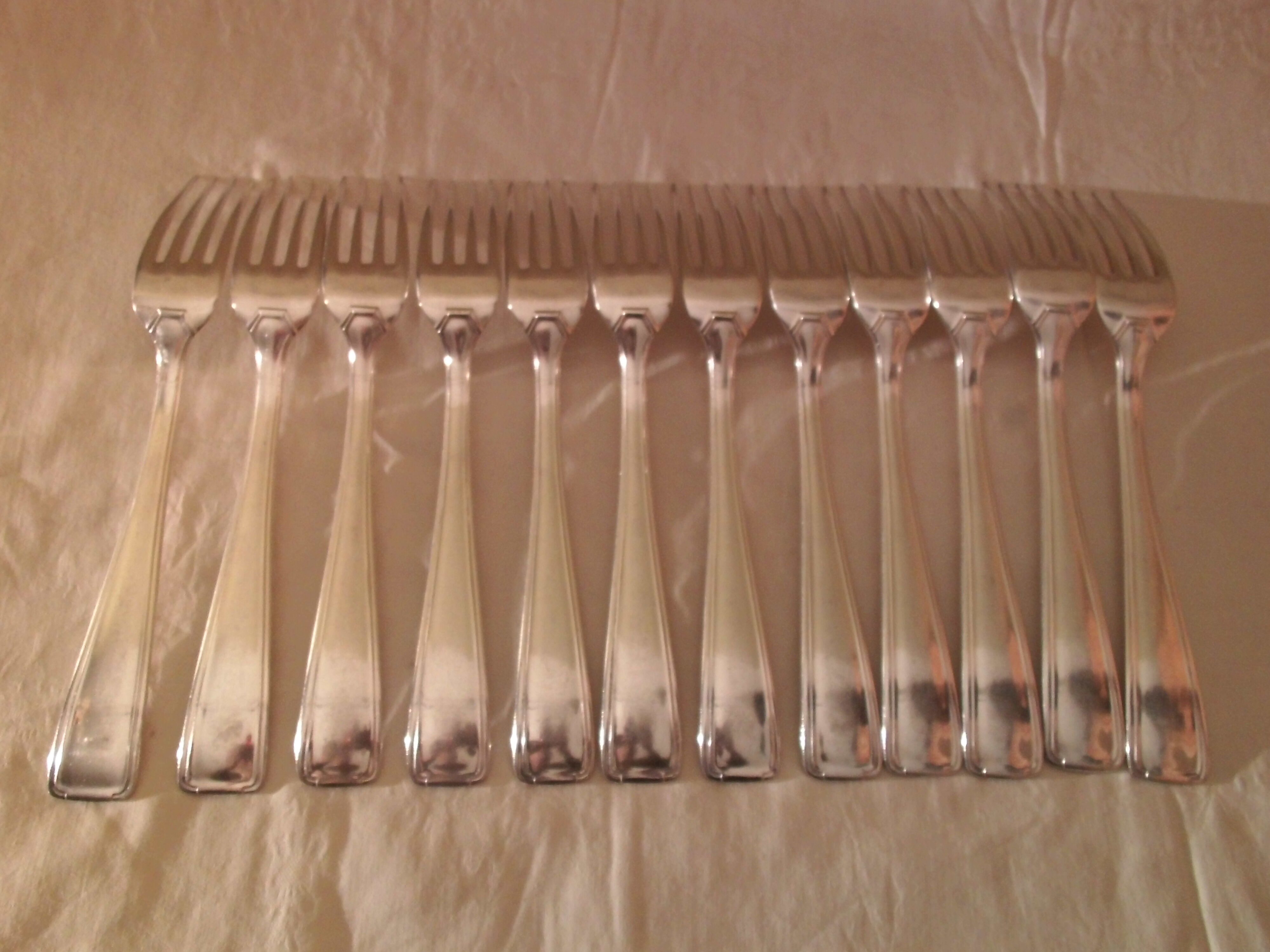 12 art deco table forks in silver metal François Frionnet
