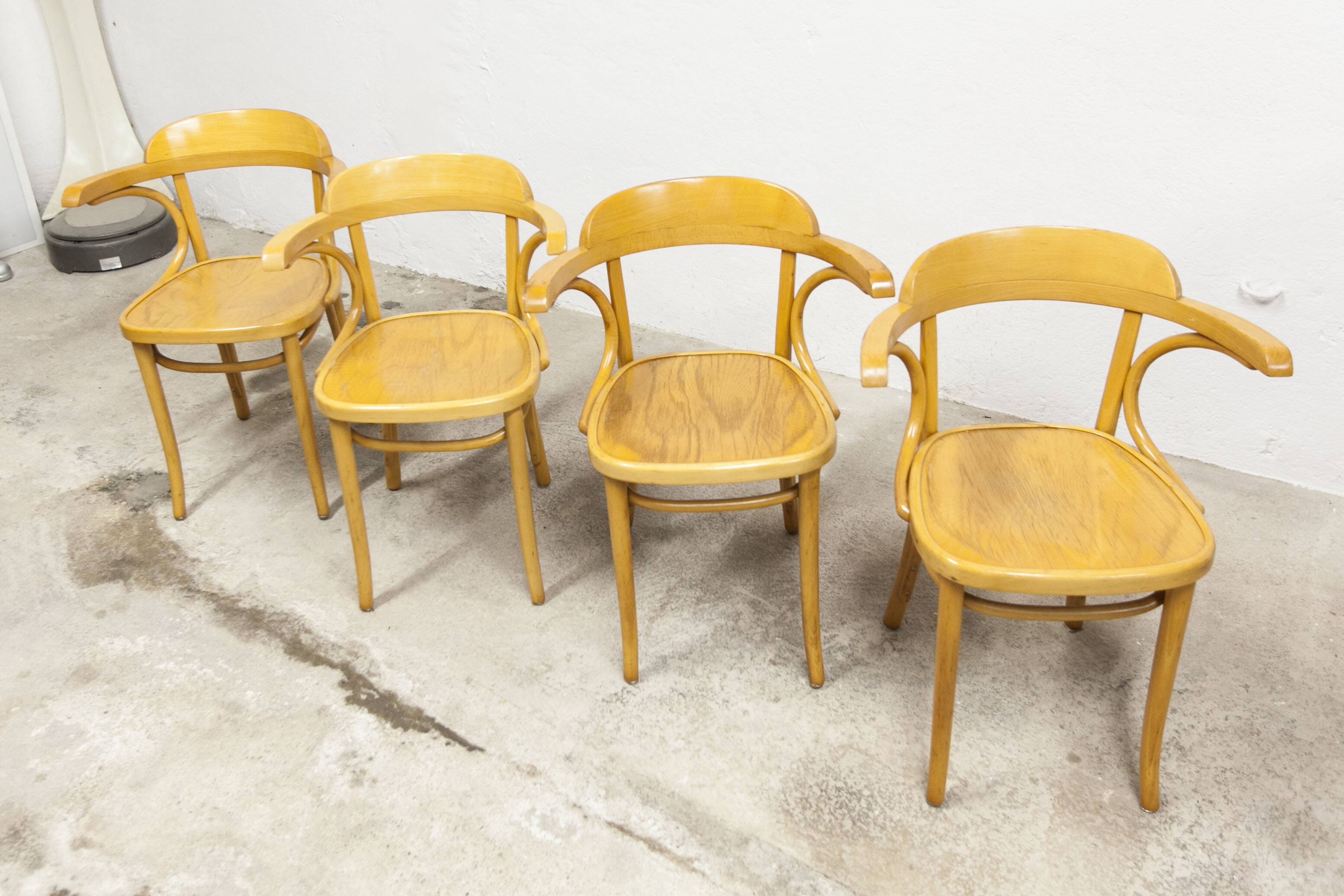 Set of 4 armchair bistro chairs from the 1960s.