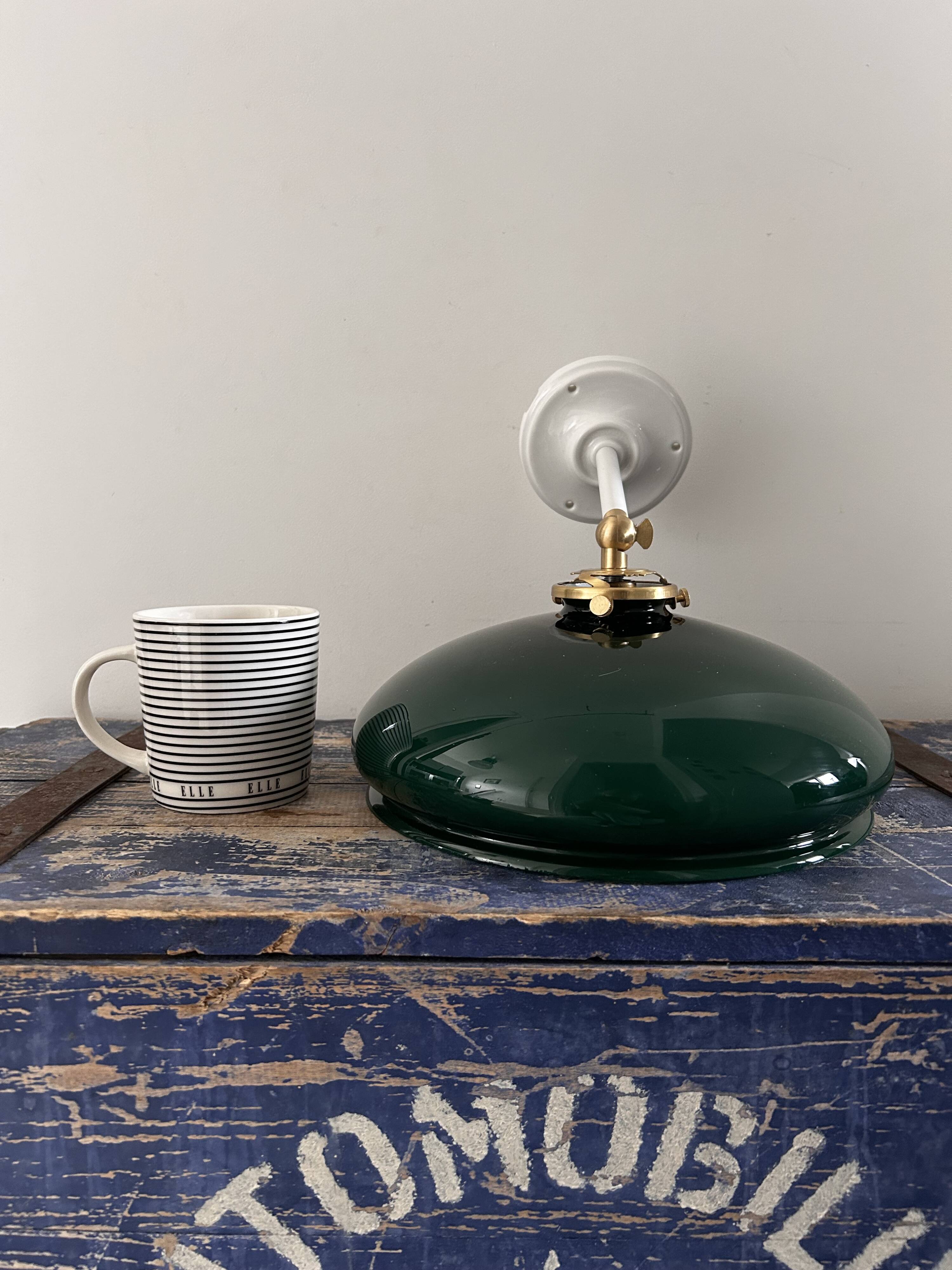Tilting wall light in green opaline