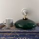 Tilting wall light in green opaline