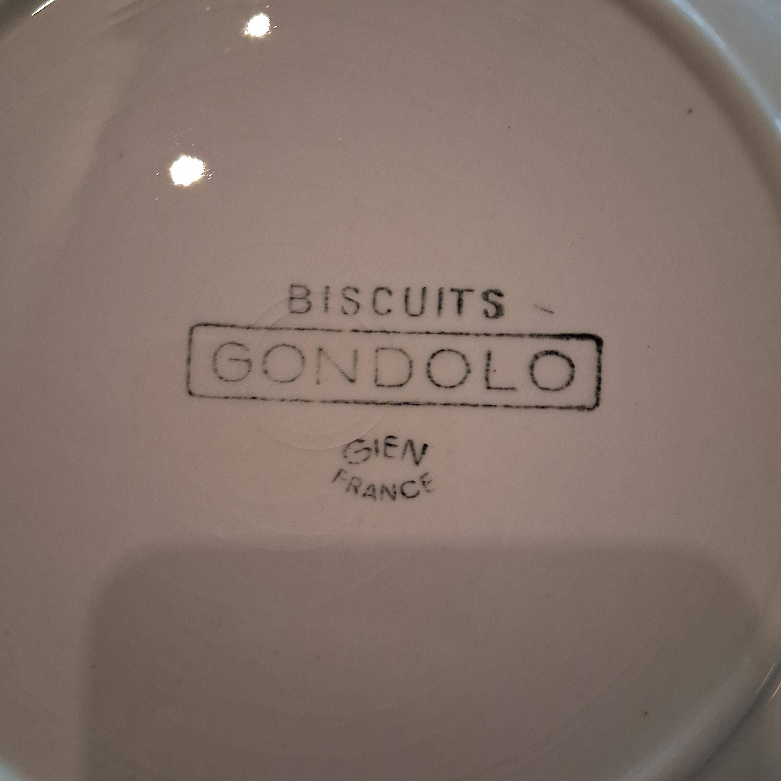 Set of 7 advertising plates from Gien "Gondolo" in good condition.