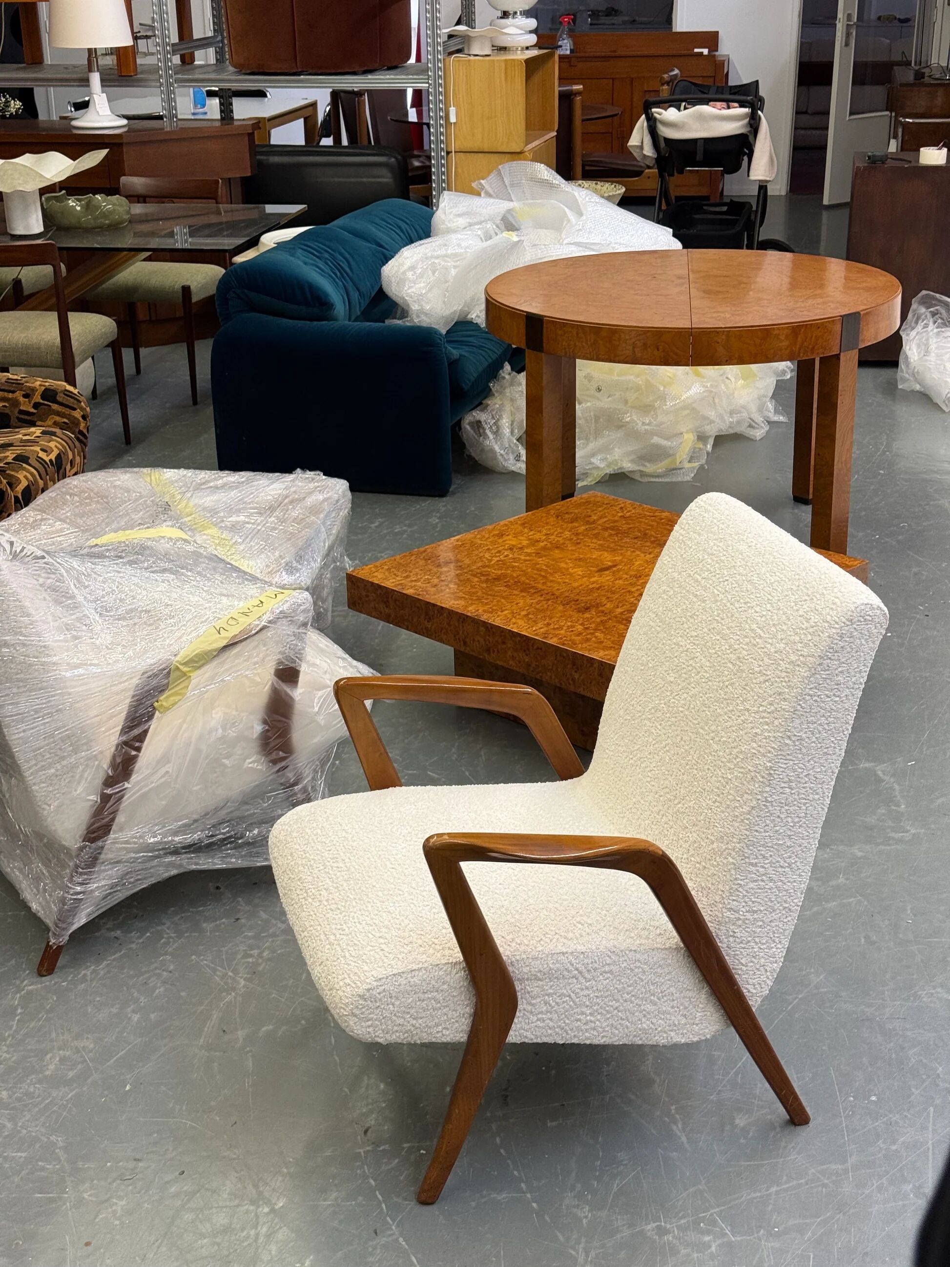 Italian mid-century lounge chair in cherry wood with white bouclé