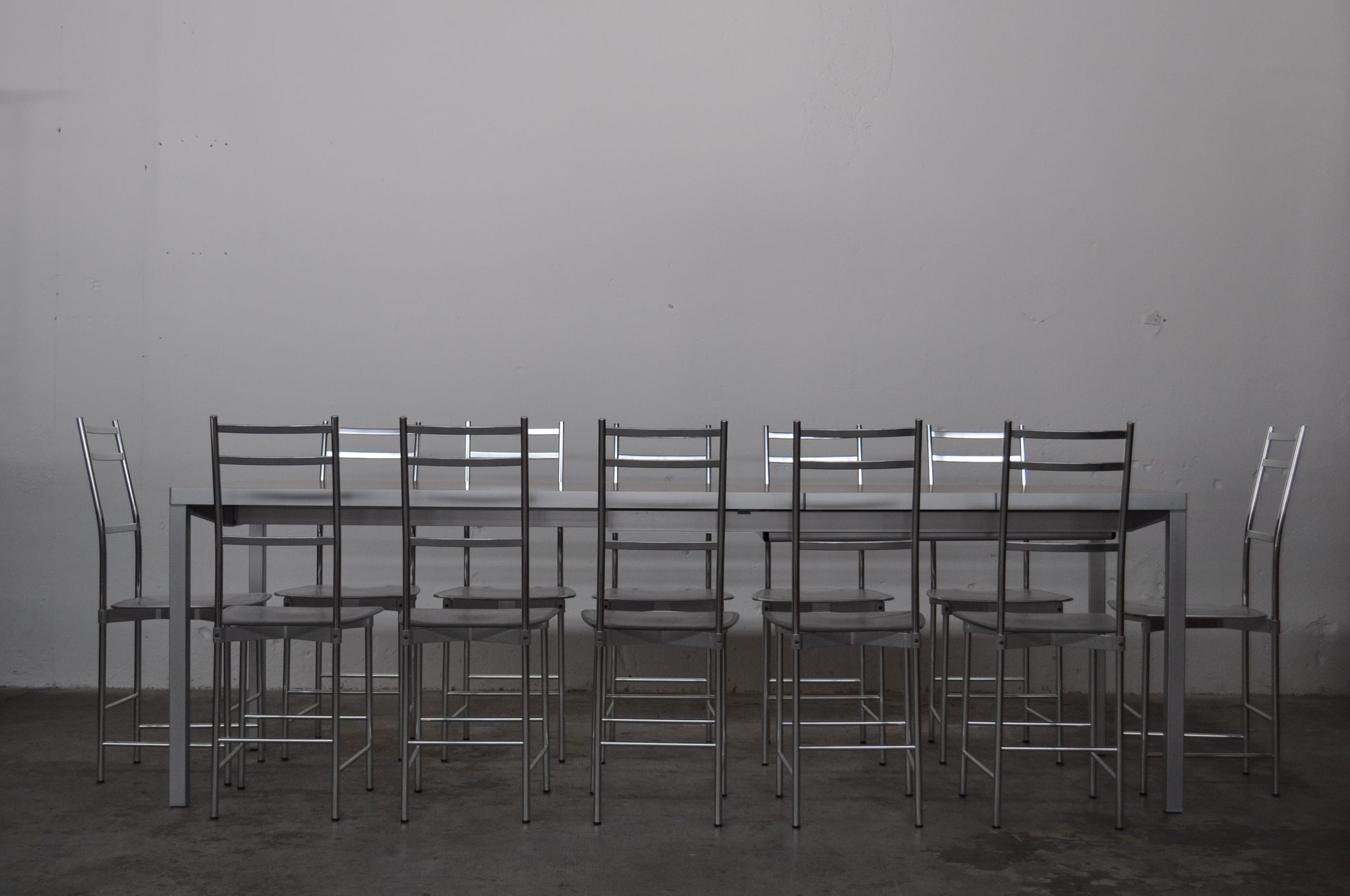 Bagutta Table and Aluminum Chairs by Opera Design for Ycami, 1980s, Set of 13