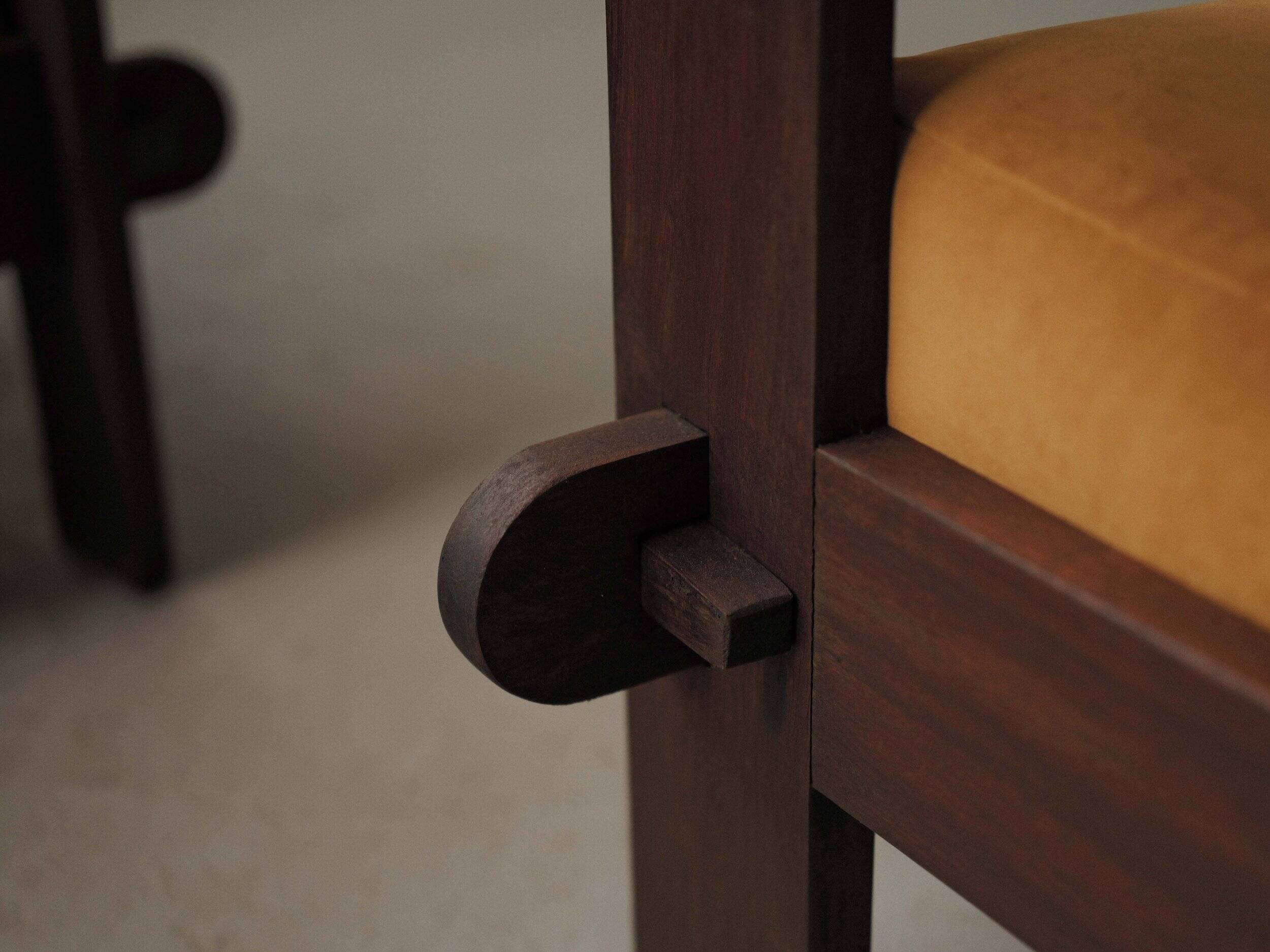 Pair of architect's armchairs in solid wood, France, circa 1970.