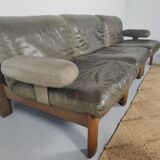 Modulable sofa an armchair in leather and wood