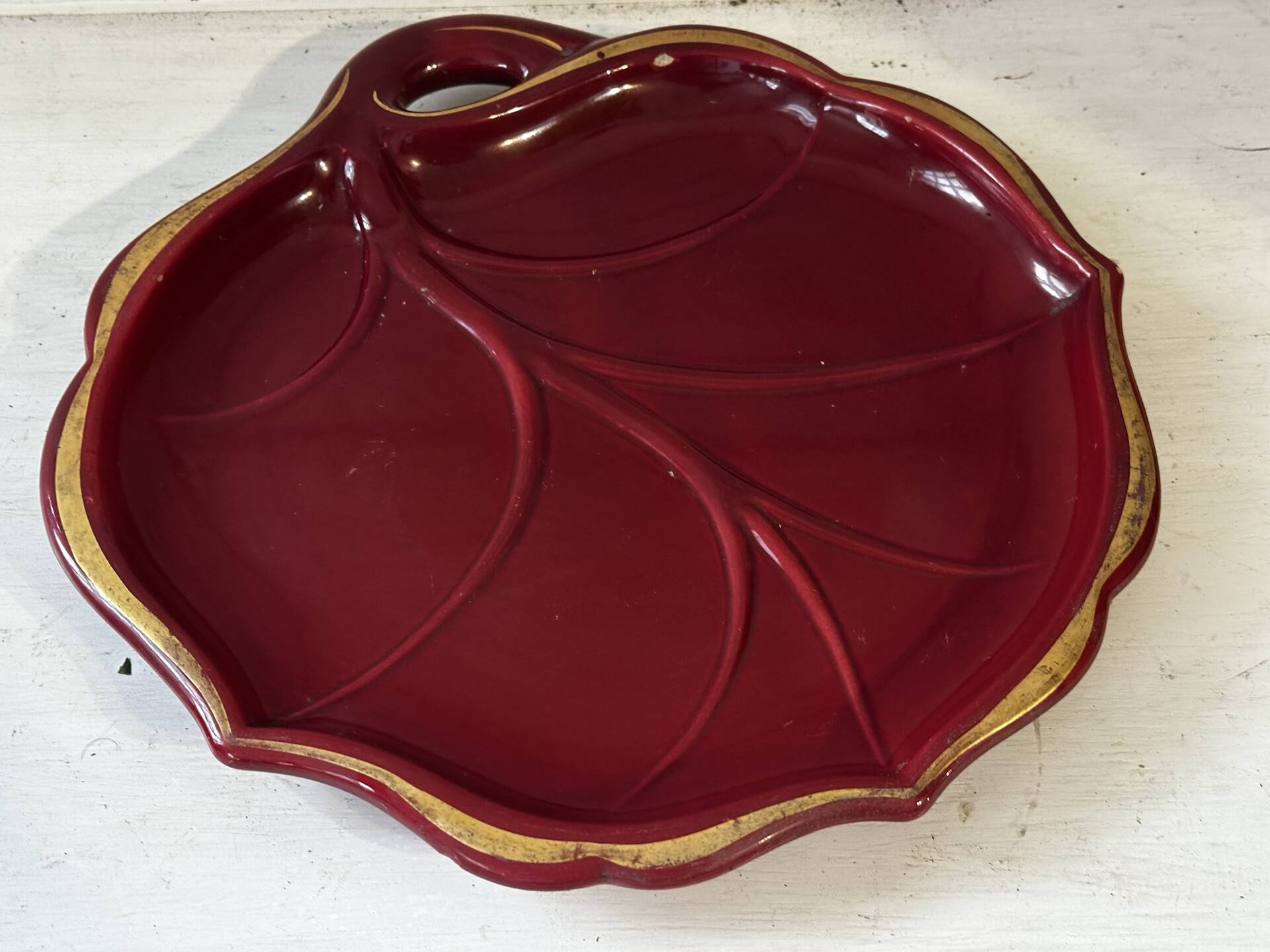 Mid-Century catchall in ruby red ceramic with gold trim – shape