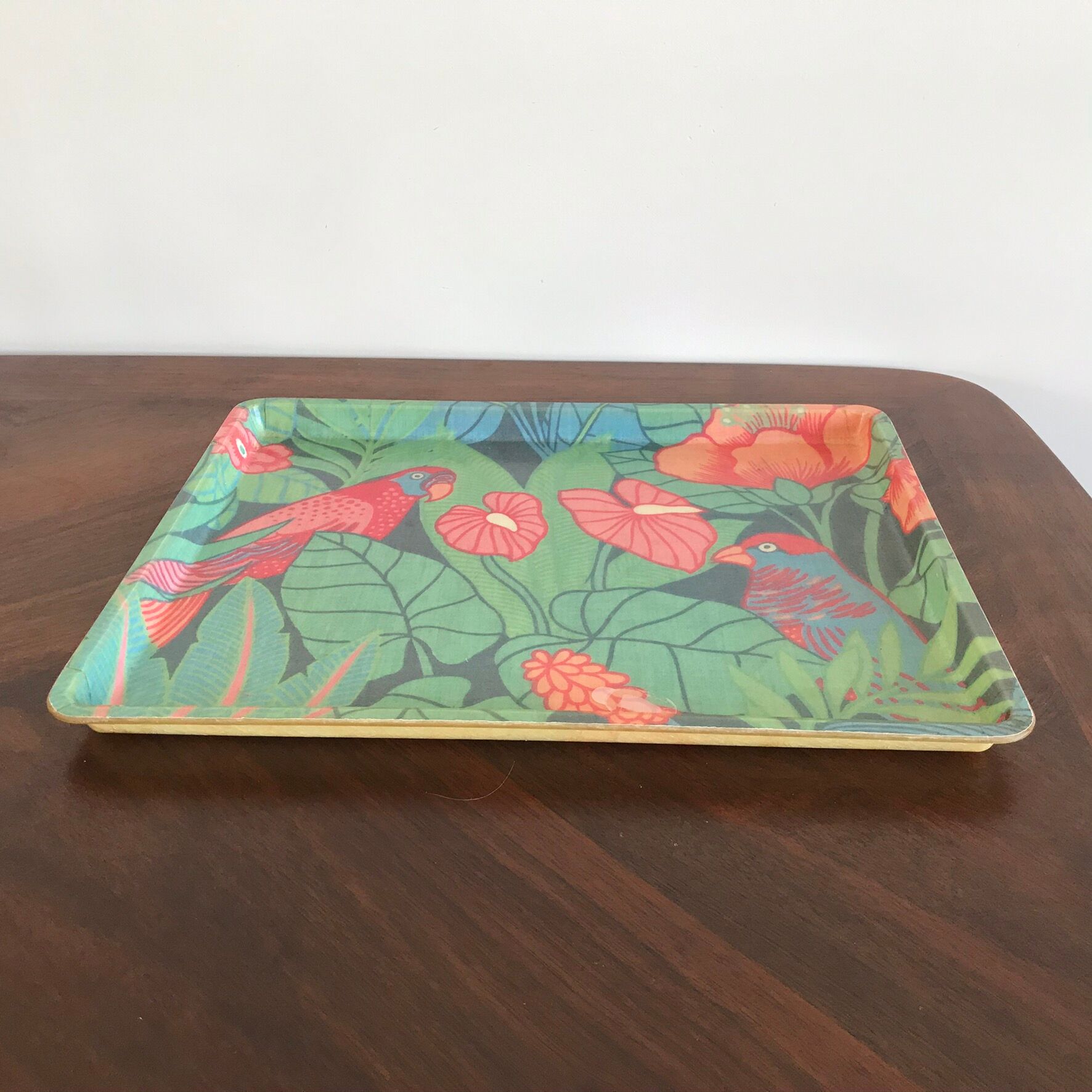 Vintage fiberglass platter with exotic décor and parrots