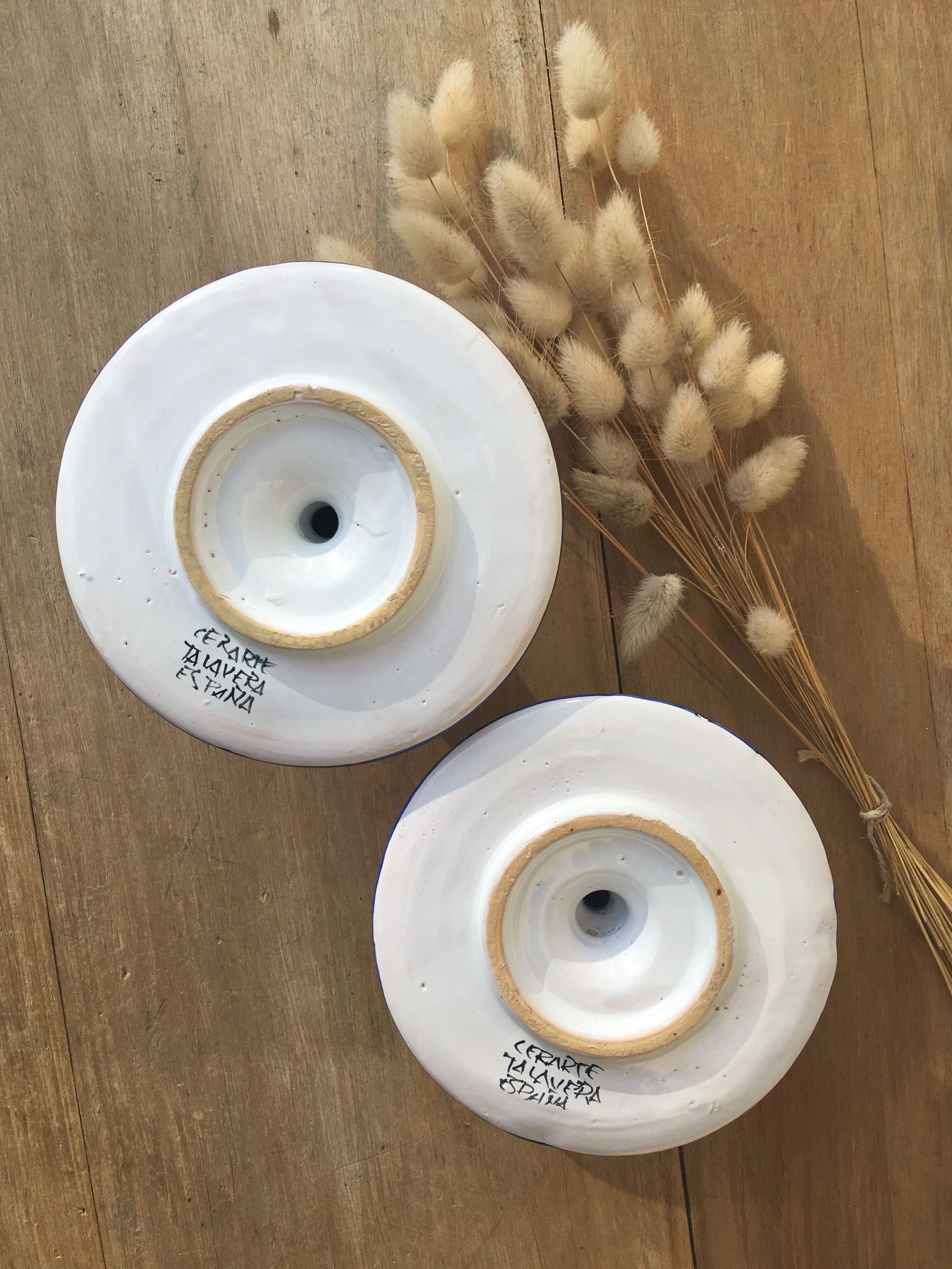 Pair of ceramic cellar rat candle holders