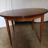 Table ronde en palissandre avec rallongedes années 70
