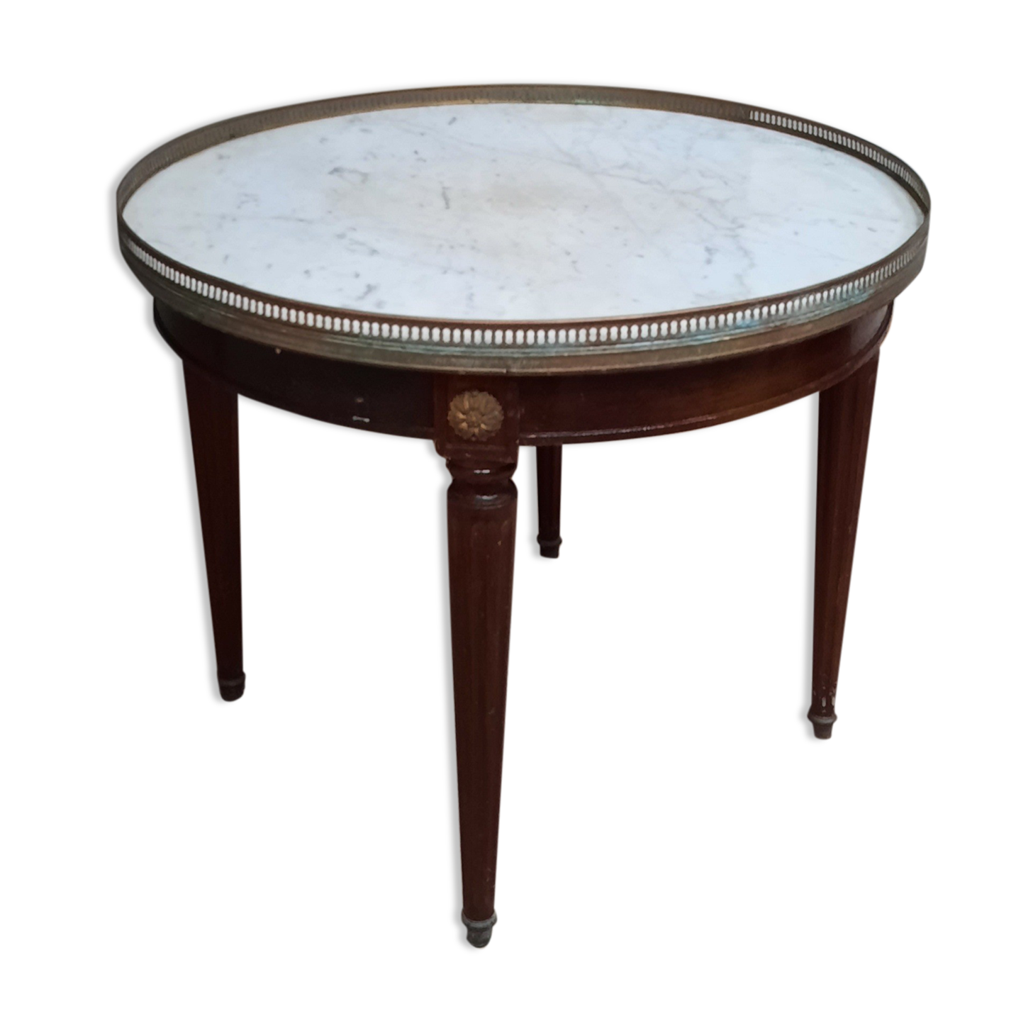 Tablr low dessu marble called "hot water bottle"