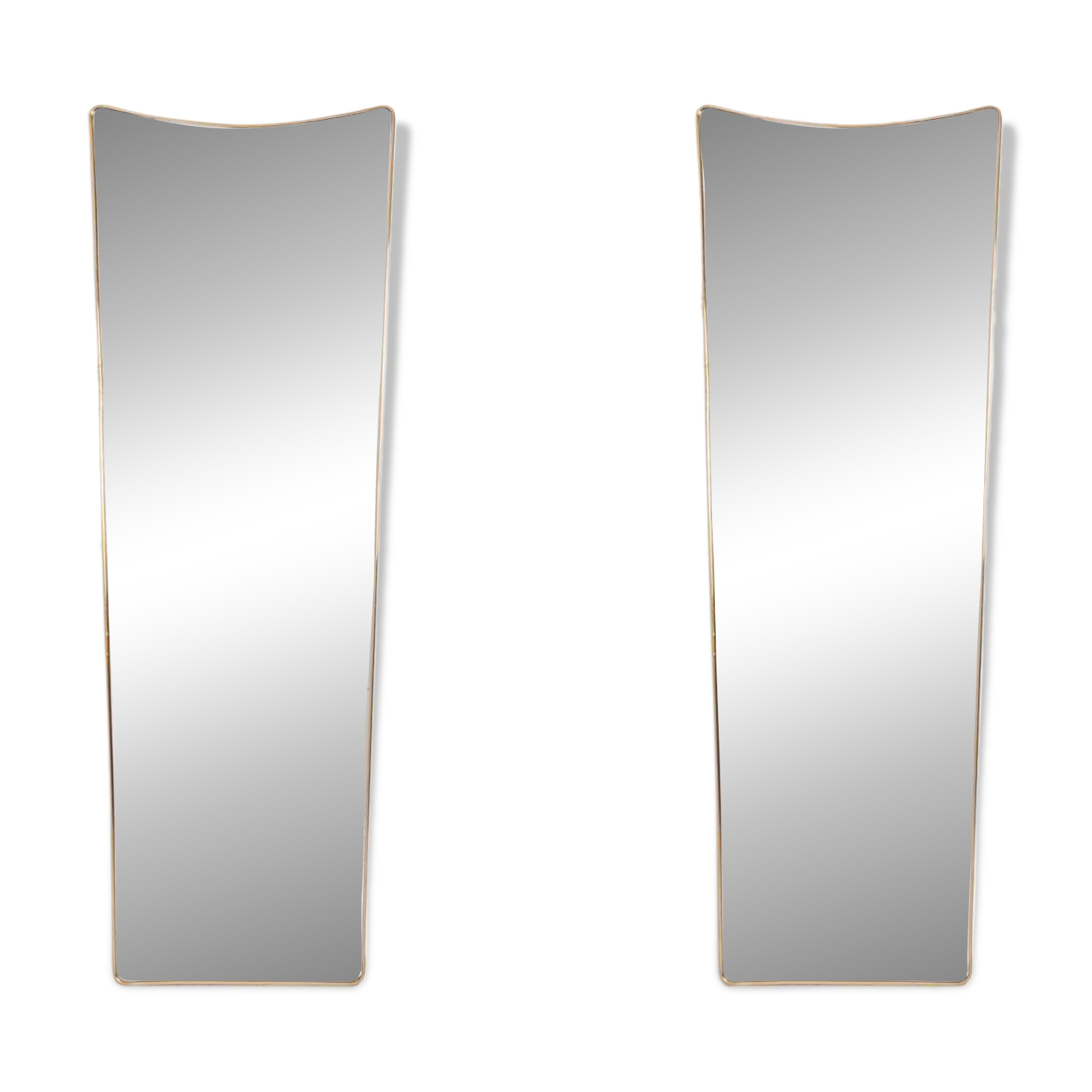 Pair of narrow gilt brass mirrors. Circa 1970.