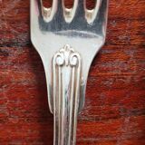 Christofle - Set of 7 dessert forks in the violoné palmette pattern.