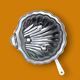Vintage stainless steel and glass shell butter dish with knife