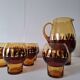 Carafe and its amber/golden glasses from the 70s.