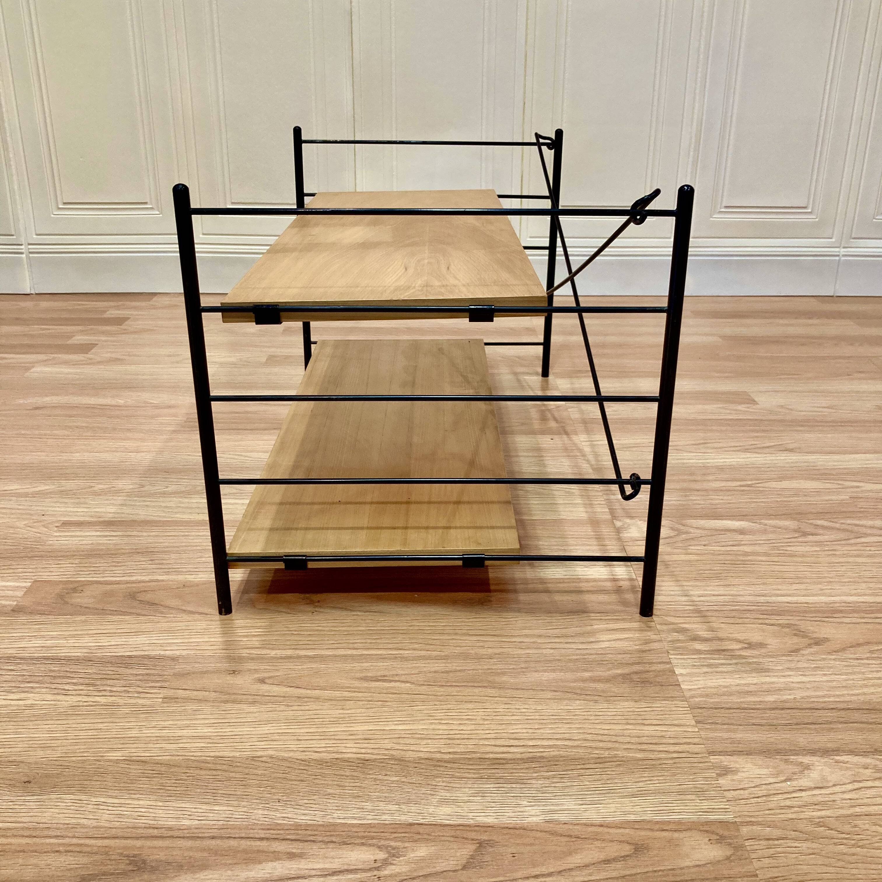 Modular metal and wood shelf design from the 1960s.