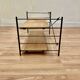 Modular metal and wood shelf design from the 1960s.