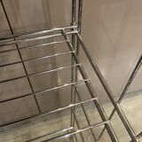 Modular wall bookshelf desk in vintage chrome.