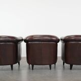 Set of three classic English-style Chesterfield cowhide  club armchairs