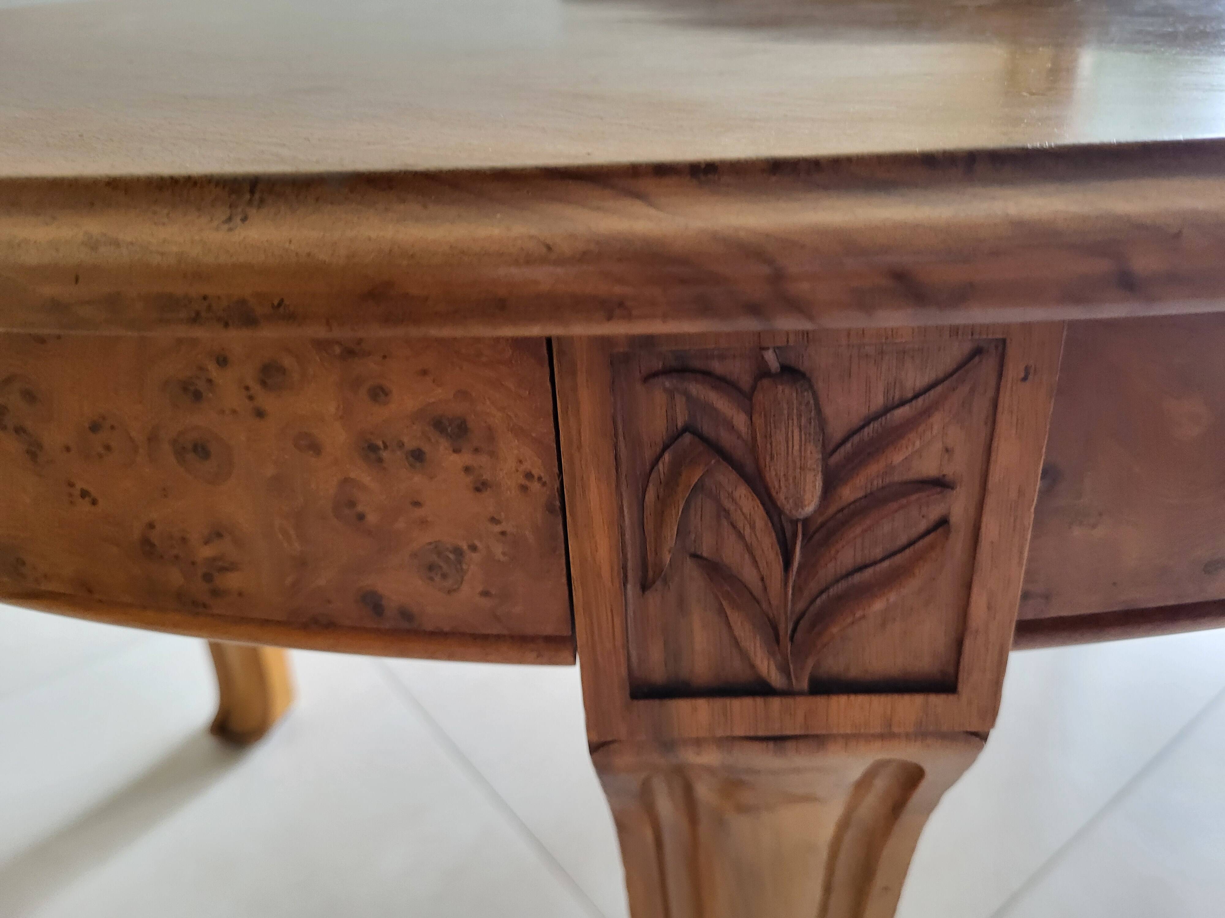 Table and 10 Art Nouveau style chairs.