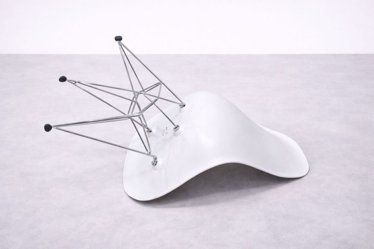 White DSR style Eames chair by Vitra with chrome Eiffel base.