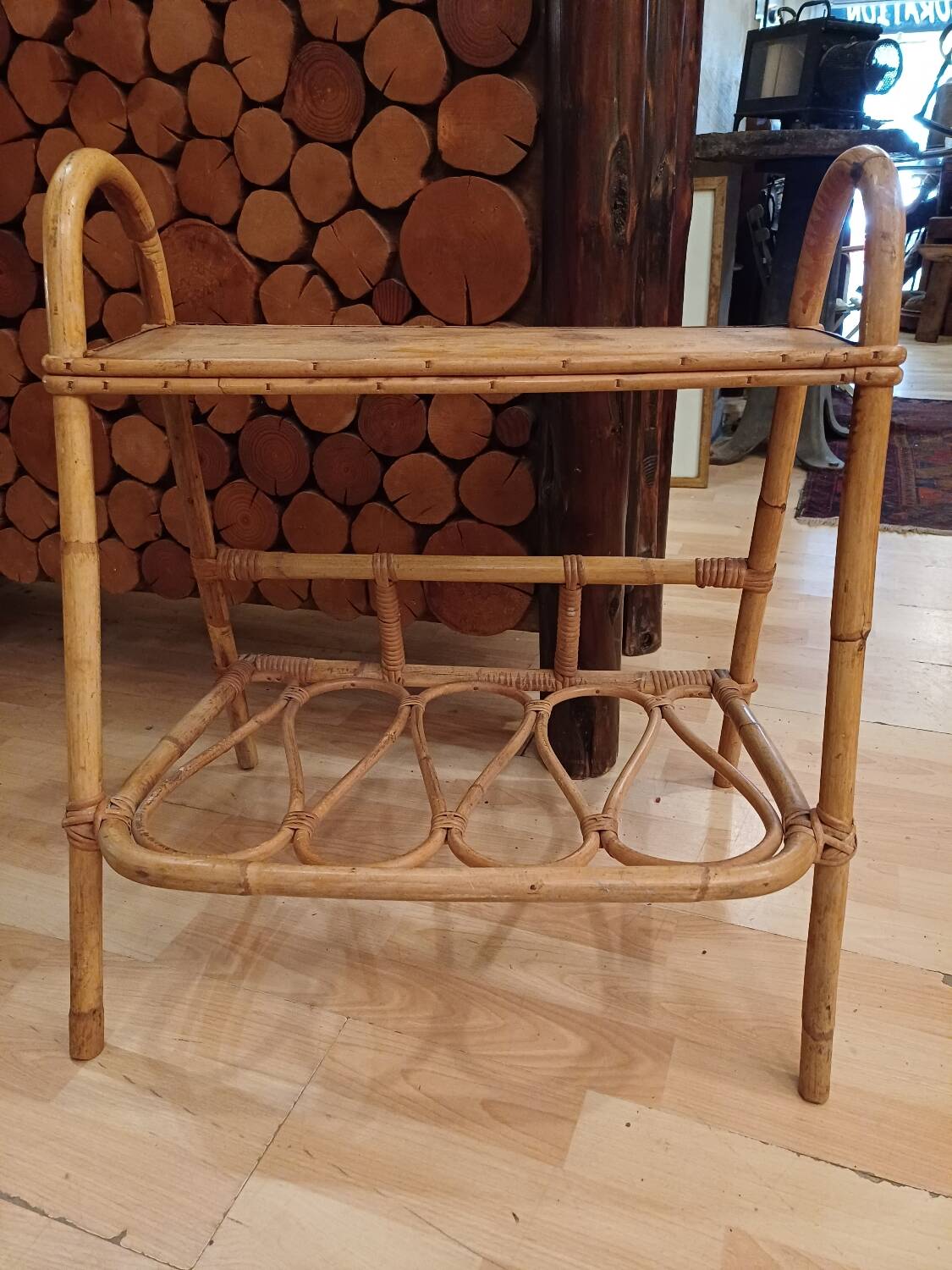 Small side piece of furniture with bamboo magazine holder, wooden top, 1960