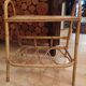 Small side piece of furniture with bamboo magazine holder, wooden top, 1960