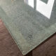 Designer garden coffee table in tempered glass and stainless steel