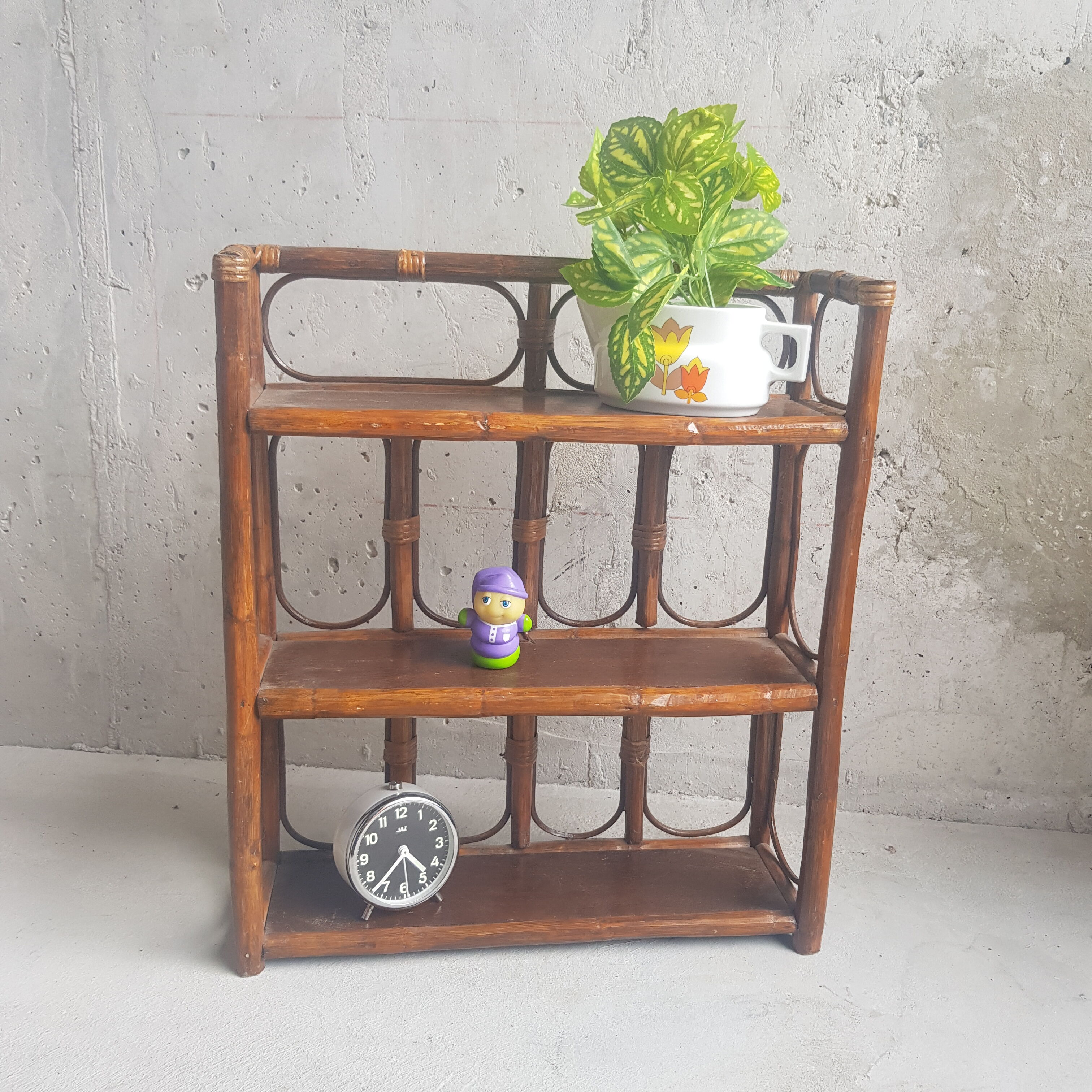 Rattan wall shelf