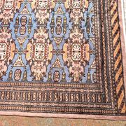 Oriental rug, size 243 x 168 cm, signed and numbered.