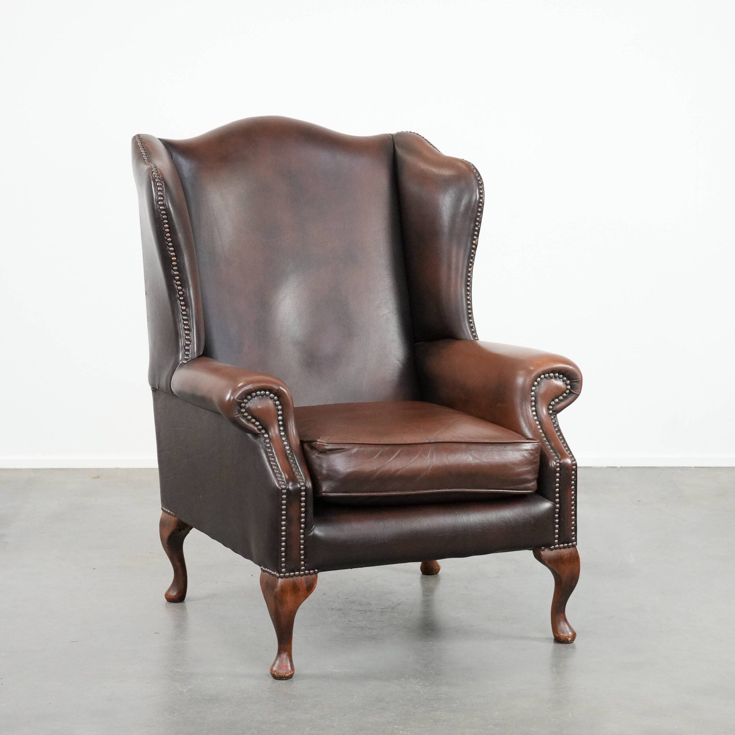 Brown smooth cow leather Chesterfield wingback armchair in English style